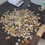 Moedas apreendas pela PM em Guaratuba